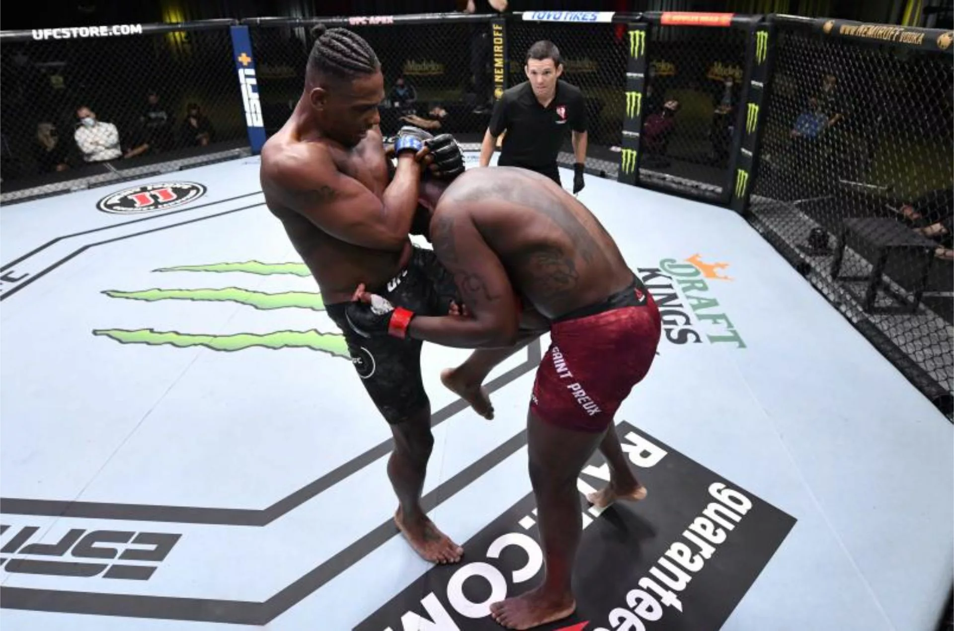 Image of Jamahal Hill Striking Opponent with knee